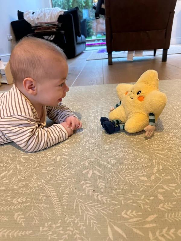 baby-boy-waching-toy